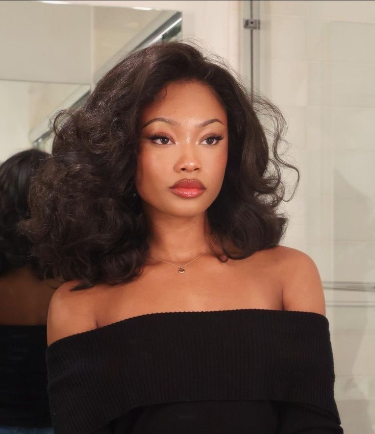 Classy lady with trendy blowout hairstyle 