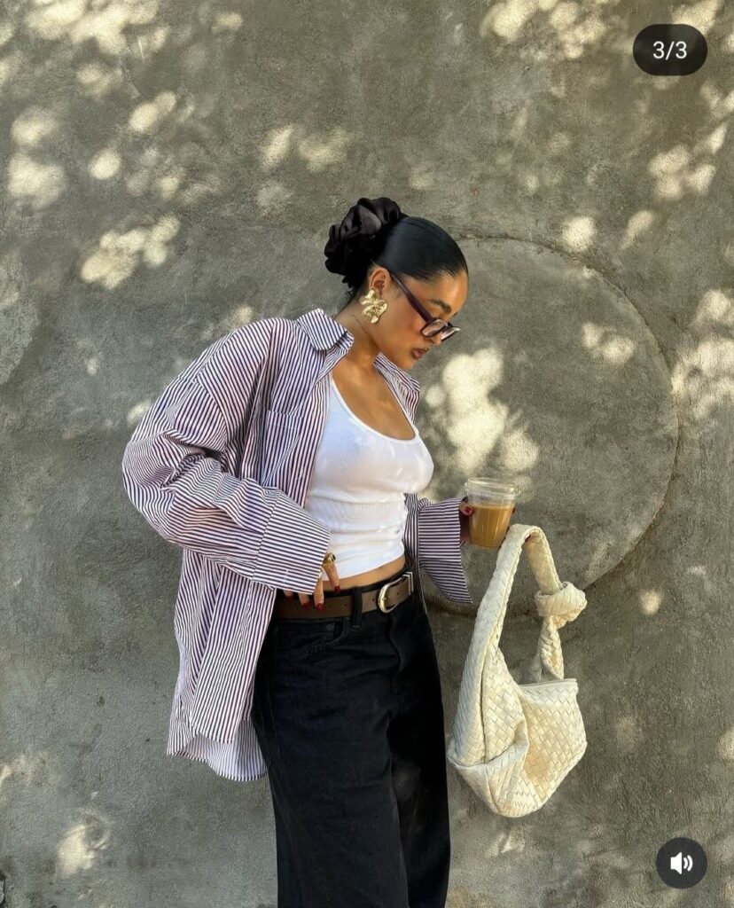 Lady putting on casual spring outfit 