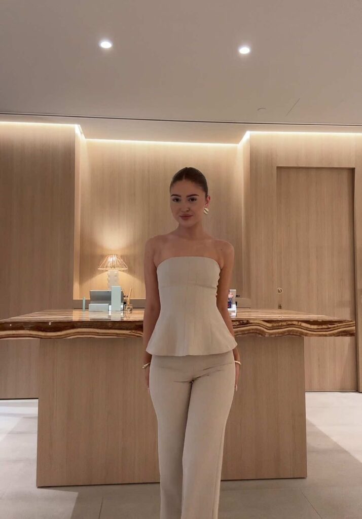 Classy lady putting one neutral color 