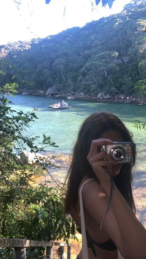 Lady taking pictures in a trip
