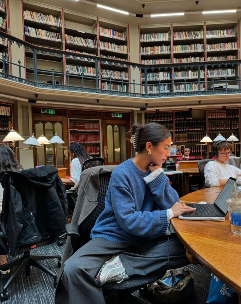 Lady reading in the library