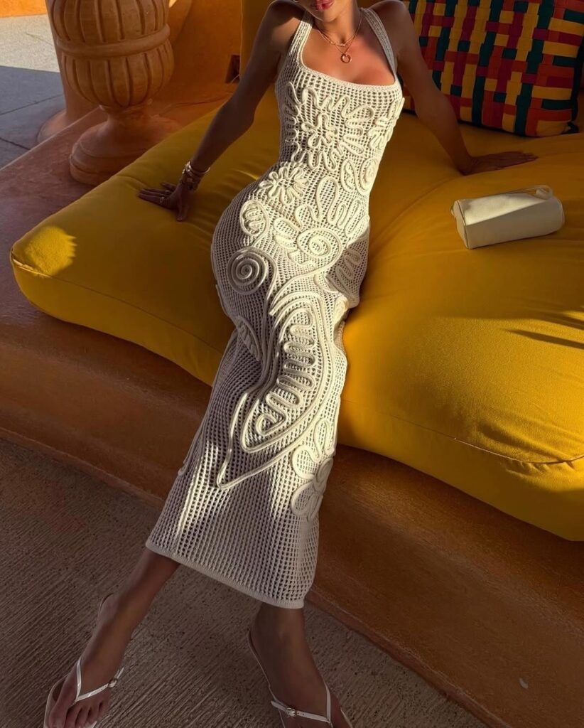 Lady putting in a knitted outfit for the summer 